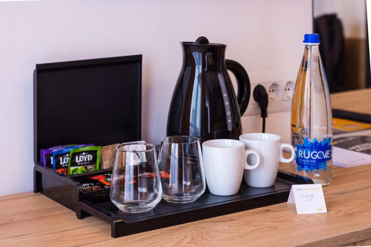 City Inn Приштина Экстерьер фото